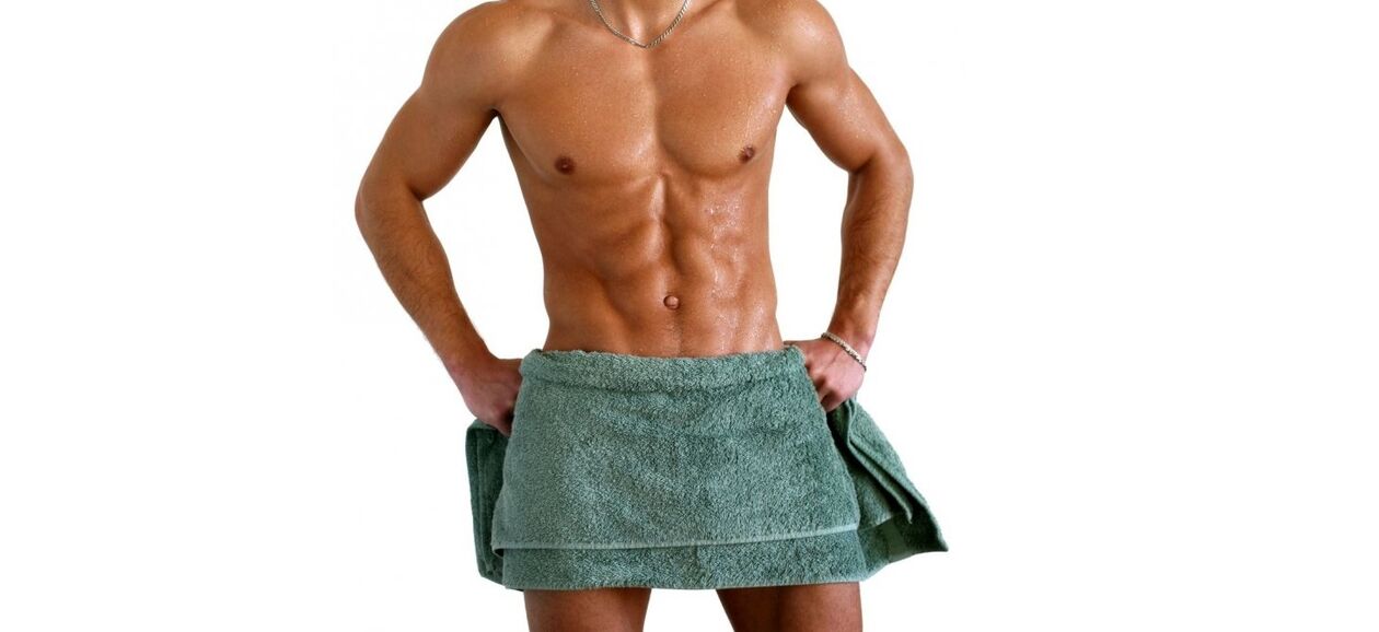 man wearing bath towel before penis enlargement